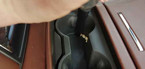 Vacuuming inside the cup holder